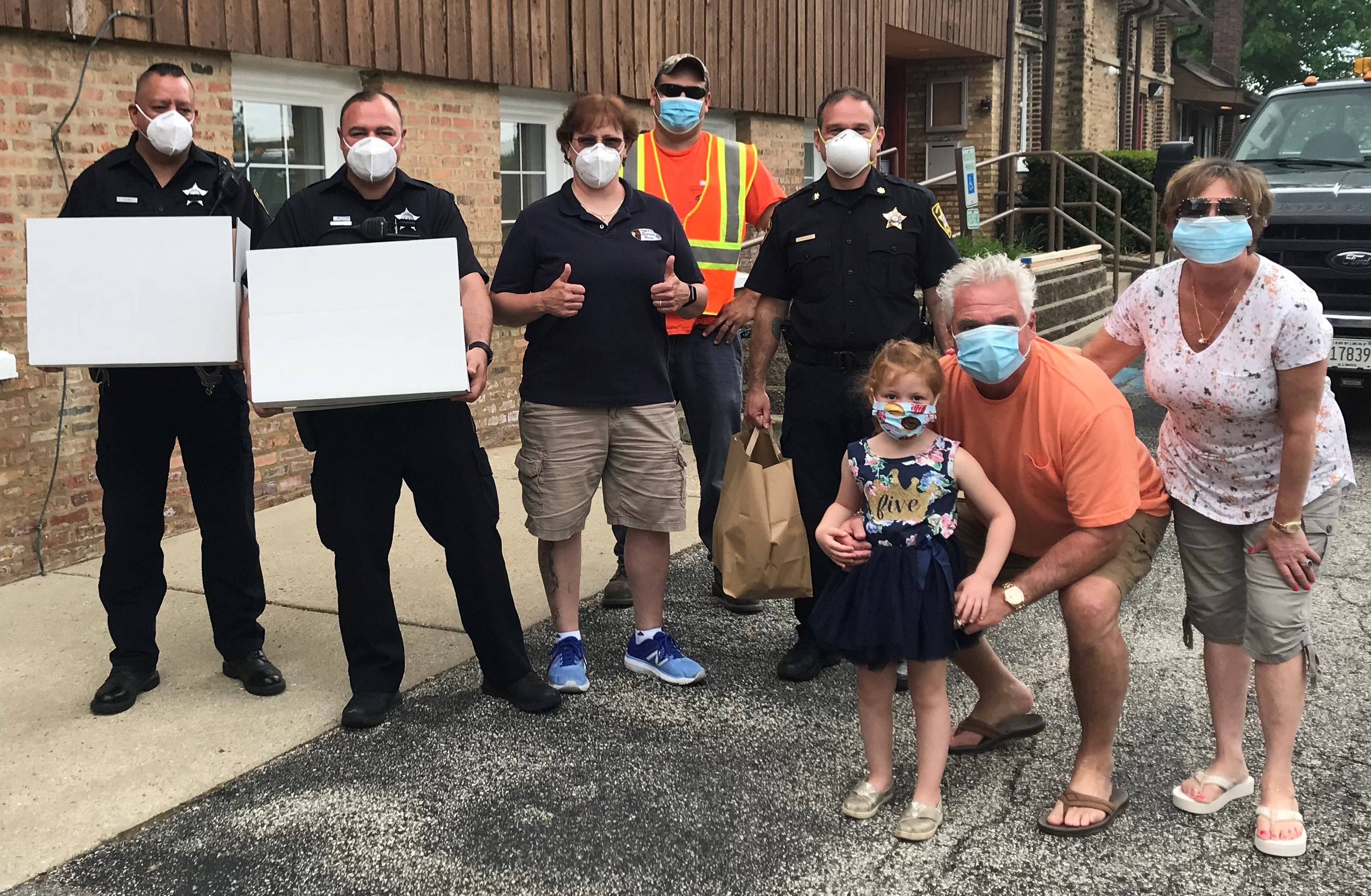 The Krumwiede family giving first responders boxed lunches